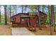 Charming two-story home with a unique architectural style and a wooded surrounding at 1150 Autumn Ridge Dr, Marietta, GA 30066