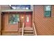 Close-up of the front door and entryway with unique architectural details at 1150 Autumn Ridge Dr, Marietta, GA 30066