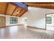 Spacious and bright open-concept living room with wood beam ceiling at 1150 Autumn Ridge Dr, Marietta, GA 30066