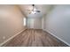 Large bedroom with new flooring and neutral wall color at 1171 Bailing Dr, Lawrenceville, GA 30043