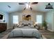 Staged bedroom with a neutral palette, complemented by stylish decor and ample natural light at 1171 Bailing Dr, Lawrenceville, GA 30043