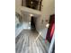 Hallway features neutral paint, plank flooring, and access to the staircase at 2805 Ne Ne Expressway Ne # B-26, Atlanta, GA 30345