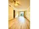 Bright living room features wood-look flooring and sliding glass doors to the balcony at 2805 Ne Ne Expressway Ne # B-26, Atlanta, GA 30345
