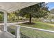 Beautiful front yard featuring mature trees and meticulously manicured landscaping at 5725 Brenda Sw Dr, Mableton, GA 30126
