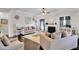 Comfortable living room with neutral tones, fireplace, decorative art, and plush seating arrangements at 15 Granville Ln, Covington, GA 30016