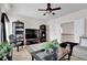 Cozy living room featuring stylish furniture, large windows, and a view of the staircase at 15 Granville Ln, Covington, GA 30016