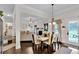 Open concept living area including dining area and living room with abundant natural light at 15 Granville Ln, Covington, GA 30016