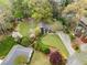 Aerial view of the property showcasing landscaping and mature trees at 259 Dartmoor Cir, Atlanta, GA 30328