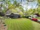 Expansive backyard with lush lawn and landscaping surrounding this stunning single Gathering home at 259 Dartmoor Cir, Atlanta, GA 30328