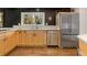 Kitchen area featuring stainless steel appliances, ample counter space, and a modern design at 259 Dartmoor Cir, Atlanta, GA 30328