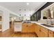 Well-lit kitchen with modern appliances, gas cooktop, and light cabinetry at 259 Dartmoor Cir, Atlanta, GA 30328