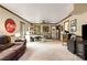 Spacious living room with a sofa, desk area, and a door to the outside at 259 Dartmoor Cir, Atlanta, GA 30328