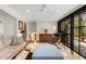 Spacious living room with large windows, hardwood floors, and modern furniture at 259 Dartmoor Cir, Atlanta, GA 30328