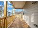 Covered back porch with wood decking, offering a view of the neighborhood and a bright, airy space at 515 Federal Se Ter, Atlanta, GA 30315