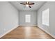 Inviting bedroom featuring hardwood floors, two windows and modern finishes at 515 Federal Se Ter, Atlanta, GA 30315