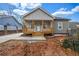 Charming home featuring a welcoming front porch and newly installed concrete driveway at 515 Federal Se Ter, Atlanta, GA 30315
