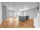 Bright living room featuring a kitchen island with a sink and gray cabinets at 515 Federal Se Ter, Atlanta, GA 30315