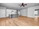 Open floor plan featuring kitchen island, modern lighting, and seamless flow for entertaining at 515 Federal Se Ter, Atlanta, GA 30315