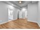 Main bedroom featuring hardwood floors and an ensuite bathroom with a double vanity at 515 Federal Se Ter, Atlanta, GA 30315