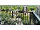 City views from this condo balcony, decorated with seasonal flowers and wrought iron railing at 195 14Th Ne St # 1507, Atlanta, GA 30309