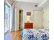 Bedroom with private balcony, hardwood floors, closet, and neutral paint at 195 14Th Ne St # 1507, Atlanta, GA 30309