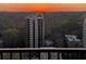 City views from this high-rise apartment during a vibrant sunset at 195 14Th Ne St # 1507, Atlanta, GA 30309