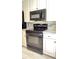 Kitchen featuring stainless steel appliances, granite countertops, and custom cabinetry at 195 14Th Ne St # 1507, Atlanta, GA 30309