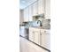 Kitchen boasting white cabinetry, stainless steel appliances, and granite countertops at 195 14Th Ne St # 1507, Atlanta, GA 30309