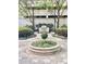 A landscaped outdoor grilling area featuring a stainless steel grill and manicured green space at 195 14Th Ne St # 1507, Atlanta, GA 30309
