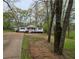 Charming single-story home with a welcoming front porch and meticulously kept landscaping at 4620 Oak Grove Cir, Cumming, GA 30028