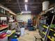 Garage featuring assorted storage bins and a work bench area at 4620 Oak Grove Cir, Cumming, GA 30028