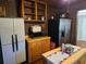 Kitchen featuring updated appliances and lots of shelving and cabinet space at 4620 Oak Grove Cir, Cumming, GA 30028