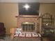 Living room showcasing a brick fireplace with decorative accents and comfortable seating at 4620 Oak Grove Cir, Cumming, GA 30028