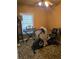Functional office with a keyboard and a recumbent bike for fitness at 4620 Oak Grove Cir, Cumming, GA 30028