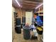 Storage space is maximized in this workshop with shelves and bins at 4620 Oak Grove Cir, Cumming, GA 30028