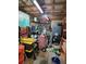 A cluttered workshop has work benches and tools everywhere at 4620 Oak Grove Cir, Cumming, GA 30028