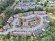 An aerial view of a townhouse community with mature trees and well-maintained landscaping at 1797 Brookside Lay Cir, Norcross, GA 30093