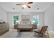 Bedroom with large windows and a ceiling fan at 1797 Brookside Lay Cir, Norcross, GA 30093