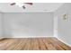 Minimalist bedroom featuring light-colored walls, wood-look floors, and a bright airy feel at 1797 Brookside Lay Cir, Norcross, GA 30093