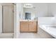 This bathroom features a vanity with a large mirror, and an enclosed shower at 2968 Greyhawk Ln, Cumming, GA 30040