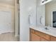 This bathroom offers a well-lit vanity and direct access to an enclosed shower at 2968 Greyhawk Ln, Cumming, GA 30040
