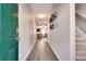 Open entryway with hardwood floors and a view into the living and dining areas at 2968 Greyhawk Ln, Cumming, GA 30040