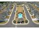 A swimming pool is centered in new home community at 70 Clark Lake Ln, Grayson, GA 30017