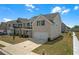 Charming two-story home with a two car garage and a well-manicured lawn at 70 Clark Lake Ln, Grayson, GA 30017