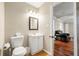 Bathroom featuring tiled floor, and sink with storage underneath at 1326 Mcpherson Ave., Atlanta, GA 30316