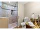 Bathroom featuring tiled shower with niche, granite countertop, and vessel sink at 1326 Mcpherson Ave., Atlanta, GA 30316