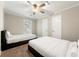 Bedroom with carpeted floor, ceiling fan, and standard closet at 1326 Mcpherson Ave., Atlanta, GA 30316