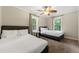 Bedroom with two beds, carpet, and natural lighting at 1326 Mcpherson Ave., Atlanta, GA 30316