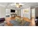 Living room boasts coffered ceilings, hardwood floors, and convenient laundry access at 1326 Mcpherson Ave., Atlanta, GA 30316
