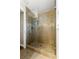 Glass-enclosed tiled shower with a rain showerhead and tile flooring at 1326 Mcpherson Ave., Atlanta, GA 30316